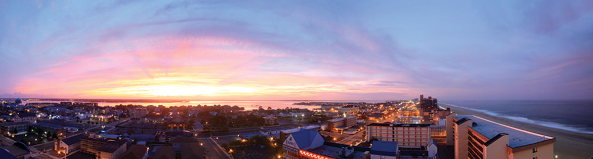 High altitude view of Ocean City at sunset, showcasing the vibrant night life and the lively atmosphere